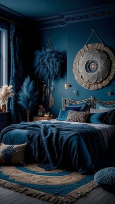 a bed with blue sheets and pillows next to a window in a room filled with plants