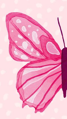 a pink butterfly with white polka dots on it's back and wings, flying in the air