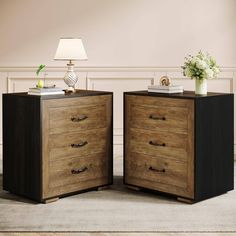 two nightstands with drawers on each side and a lamp on the other end in front of them