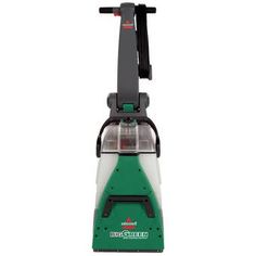 a green and white carpet cleaner on a white background