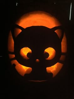 a cat pumpkin carved into the shape of a jack o lantern