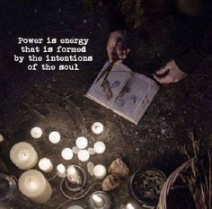 a person is reading a book with candles around it and the words power is energy that is formed by the intentionss of the soul