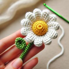 This Amigurumi Daisy Crochet Pattern allows you to create a beautiful handmade crochet flower, perfect for beginners and experienced crocheters alike. The pattern is delivered as a PDF file and includes detailed, step-by-step instructions, complete with photos and diagrams to help guide you through each stage. What you'll get: A downloadable PDF file with clear instructions on how to crochet the daisy (available in multiple languages). The pattern is available in English, French, German, Italian, and Spanish. Detailed explanations for creating the white petals, yellow center, green stem, and leaves. Suggestions for materials and tools, including yarn types and hook sizes. The pattern also includes measurements for a finished daisy approximately 10 cm tall. This pattern is perfect for: Craf Amigurumi Daisy, Daisy Crochet Pattern, Plant Crochet, Crochet Flower Pattern, Daisy Crochet, Handmade Gifts For Friends, Advanced Crochet, Crochet Daisy, Crochet Flower Patterns