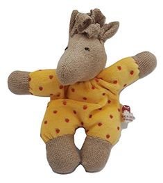 a small stuffed giraffe wearing a yellow outfit with polka dots on it's legs