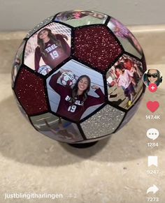 a close up of a soccer ball with pictures on it