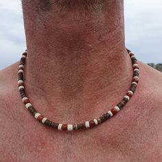 Men's Quality Surfer Jewelery - Necklaces and more....  Men's Handmade Surfer Style Jewellery, Summer Jewelery  Discover our unique selection of Men's Quality Surfer Jewellery. Our collection includes various necklaces made of robust materials such as stainless steel, coconut pearls and gemstones. Each piece is meticulously handcrafted and designed to embody the casual and adventurous lifestyle of surfers and outdoor enthusiasts. With us you will find exactly the right accessory for the beach, e Mens Surfer Style, Beach Style Jewelry, Jewellery Summer, Surfer Jewelry, Boys Necklace, Mens Beaded Necklaces, Surf Jewelry, Tiger Eye Jewelry, Surfer Style