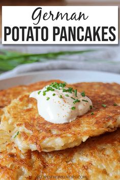 a stack of german potato pancakes on a plate with butter and chives in the background