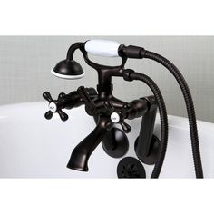 the faucet is attached to the bathtub with two handset hoses