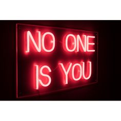 a neon sign that says no one is you