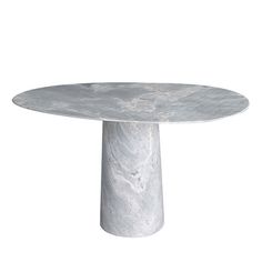 a white marble table with an oval base