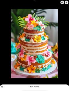 a multi layer cake with flowers on it