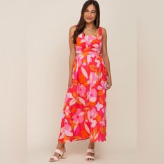 A Sleeveless Floral Maternity Maxi Dress Featuring A Cutout Self-Tie Back, Side Pockets And A Square Neckline. Illa Illa By Pinkblush New Without Tags Inventory #P9600 Pink V-neck Sleeveless Summer Dress, Pink Floral Print Sleeveless Dress For Beach, Pink Floral Print Sleeveless Dress For The Beach, Feminine Pink Sleeveless Vacation Dress, Pink Flowy Sleeveless V-neck Dress, Pink Flowy Sleeveless Dress With Floral Print, Feminine Pink Sleeveless Dress For Garden Party, Flirty Pink Maxi Dress For Summer, Spring Sleeveless Flirty Maxi Dress