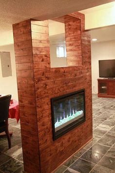 a living room filled with furniture and a fire place