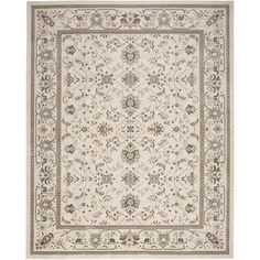 a white rug with an ornate design on the bottom and sides, in various colors