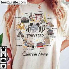 a woman wearing a white tshirt with the words world traveler in front of her