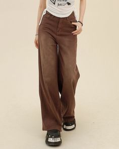 These brown jeans feature a loose fit and a heart-shaped patch on the back pocket with frayed edges, adding a unique vintage touch to their comfortable design • XS: Waist: 60cm/ 23.6 in, Hips: 84cm/ 33.1 in, Length: 102cm/ 40.2 in• S: Waist: 64cm/ 25.2 in, Hips: 88cm/ 34.6 in, Length: 103cm/ 40.6 in• M: Waist: 68cm/ 26.8 in, Hips: 92cm/ 36.2 in, Length: 104cm/ 40.9 in• L: Waist: 72cm/ 27.3 in, Hips: 96cm/ 37.8 in, Length: 105cm/ 41.3 in• XL: Waist: 76cm/ 29.9 in, Hips: 100cm/ 39.4 in, Length: 10 Y2k Wide Leg Brown Pants, Y2k Style Brown Wide Leg Pants, Distressed Brown Bottoms For Fall, Brown Wide Leg Y2k Bottoms, Baggy Brown Jeans For Streetwear, Brown High-waist Jeans For Streetwear, Trendy Brown High Waist Jeans, Trendy High Waist Brown Jeans, Trendy Brown High-waist Jeans