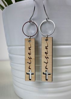 Wood earrings featuring a cross and the word Risen for our savior Jesus Christ with silver accents and stainless steel earwires. They measure approximately 3" long and are extremely lightweight. Christian Earrings, Earrings Cross, Engraving Ideas, Easter Jewelry, Easter Earrings, Jewelry Wood, Laser Cut Earrings, Cut Earrings, Our Savior