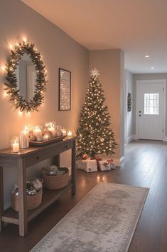 a living room with a christmas tree in the corner and other decorations on the floor