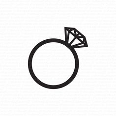 a wedding ring with a diamond on it's side, in black and white