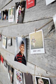 an instagramted photo hangs on a wooden wall with photos pinned to the side