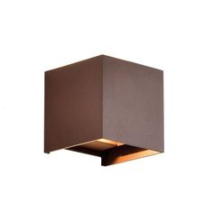 a square shaped light fixture on a white wall with a brown box in the middle