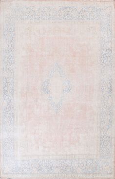 an antique rug with blue and pink colors on the border is shown in this image