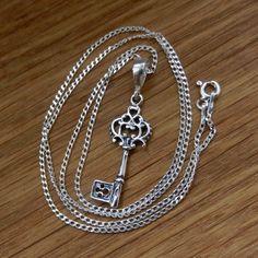 "Sterling Silver necklace with KEY pendant. Curb Chain 1.4mm . Select Length CHAIN. Nickel free. Very good quality, hallmarked 925, made in EU.  Select Length.: - 15.74'' (40cm) - 17.5\" (45cm) - 20'' (50cm) - 21.65'' (55cm) - 24'' (60cm) Clasp: Spring Ring Size: 1.4mm Pendant: 38mm Size key: 30mm x 10mm EARRINGS  for set available here: https://www.etsy.com/listing/784007837/sterling-silver-hoop-earrings-key-elf?ref=shop_home_active_1&frs=1" Key Ornament, Rose Gold Chain Necklace, Crystal Spikes, Romantic Necklace, Key Pendant Necklace, Silver Key, Gold Chain With Pendant, Rose Quartz Pendant, Valentines Necklace