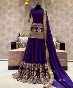 Made to Order/Measurement/Custom Order Lehenga - Color : purple  - Fabric : embroidered Georgette  - Fully flared paneled lehenga -   Attached  Dupatta with Blouse - Drawstring closure with Tassels - - It can be customize in any design or size  PLEASE NOTE: BUYERS ARE RESPONSIBLE FOR ANY CUSTOMS AND IMPORT TAXES THAT MAY APPLY. This is a made to order product. If you opt for 'Made To Measurement Option', we will provide a measurement template and you can share the measurements likewise. If you want to opt for 'Standard Size', Please refer to the size chart provided in the listing. Shipping: Standard Shipping is done by DHL ecommerce and it mostly takes 2 to 3 weeks to deliver after dispatch. Express Shipping is done by DHL express and it mostly delivers within a week after dispatch. Fabric Purple Garara Dress, Purple Sharara Designs, Traditional Drape Purple Palazzo Set For Wedding, Purple Traditional Drape Palazzo Set For Wedding, Purple Palazzo Set With Dori Work For Wedding, Purple Wedding Palazzo Set With Pallu, Purple Palazzo Set With Pallu For Wedding, Purple Georgette Palazzo Set For Wedding, Wedding Navratri Purple Palazzo Set