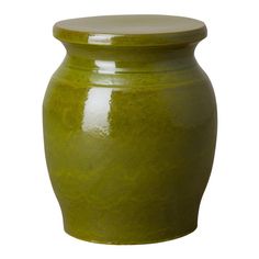 a green ceramic jar with lid on white background