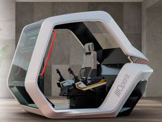 a futuristic vehicle is parked in the middle of a room