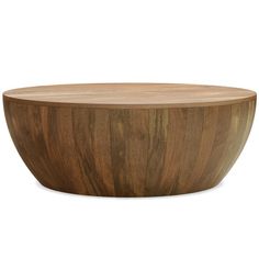 a wooden bowl sitting on top of a table