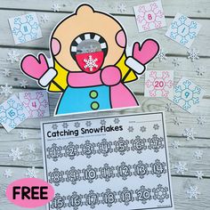 a snowflakes cutout with the numbers for catching snowflakes on it