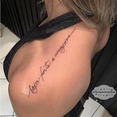 the back of a woman's shoulder with an inscription on it that says, be fearless