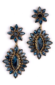 Exude extreme sparkle in these tonal crystal drop earrings anchored by floral clusters sure to make a glamorous statement. 2" drop, 1" width Post back Steel post back Goldtone plate/leather/glass/cotton Imported Deepa Gurnani, Jewelry Accessories Earrings, Steel Post, Crystal Drop Earrings, Fabric Gift Bags, Earrings Blue, Stunning Earrings, Crystal Drop, Keep Jewelry