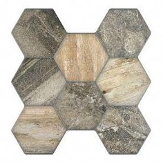 a hexagonal tile pattern made up of different colors and sizes, including brown, beige