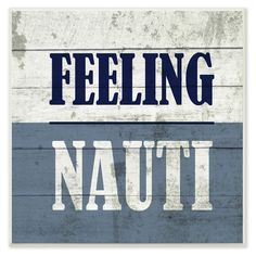 a blue and white sign that says feeling nautit on the side of a wooden wall