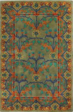 a green rug with blue, red and orange designs on the bottom half of it