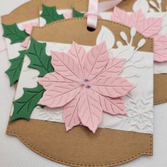 some pink and green christmas decorations on a table