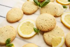 lemon and basil cookies are arranged on a table