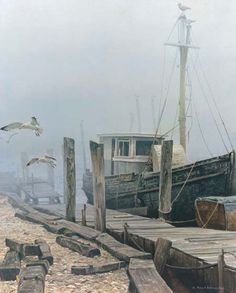 two birds flying over a boat in the water on a foggy day with seagulls