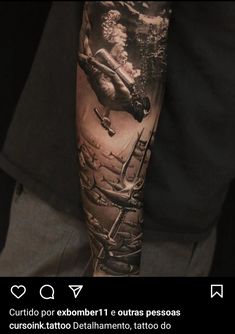 a man with a tattoo on his arm