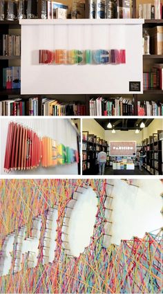 there are many books on the shelves in this library, and one is made out of strips of yarn