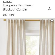 the curtains are hanging on the window sill