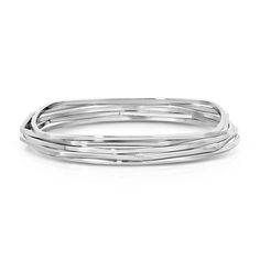 Skinny bangle set contains different shaped skinny bangles. Bangles measure 1/16" thick each with a diameter of 2.625"Finishes Available:14K Yellow Gold Rhodium (Silver) Classic Bangles, Bangle Set, Brass Jewelry, Jewelry Cleaner, Bangles Jewelry, Sustainable Materials, Shine Bright, 10k Gold, Ring Earrings