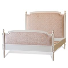 a white bed with pink upholstered headboard and foot board is shown against a white background