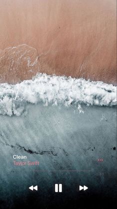 an aerial view of the ocean with waves coming in to shore and red text that reads clean beach swift