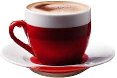 a red and white coffee cup sitting on top of a saucer filled with liquid