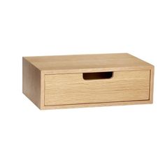 a wooden box with a hole in the middle on a white background, it is also used for storage