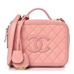 This is an authentic CHANEL Caviar Quilted Medium CC Filigree Vanity Case in Rose Pink. This chic stylishtravel bag is crafted of luxurious diamond quilted caviar leather in dark pink. The elegant shoulder bag featuresan aged gold chain link, aged gold leather threaded shoulder strap and a large Channel CC stitched logo on the front. The two zipper open all around to a matching leather interior with a zipper pocket and central zipper compartment. Classic Phones, Stylish Travel Bag, Chanel Classic Flap Bag, Chanel Crossbody, Classic Flap Bag, Chanel Mini, Chanel Shoulder Bag, Pink Chanel, Vanity Case