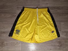 Dear friends and customers! You are offered a used goalkeeper shorts  Portsmouth FC England jako 2000s yellow black training  mens adult  XL/2XL. Very good condition  9,5/10, almost like new. Shorts for everyone who loves  football, sports, running, outdoor training and likes to wear sportswear. Check sizes: A width waist - 39 centimeters. B length from waist to bottom - 46 centimeters. C thigh width - 39 centimeters (1 cm = 0.39 inch). Check photos for condition. Goods are prepared, packaged and dispatched within 3 days. Items are shipped - with tracking number. Mail is delivered  2-6 weeks to destinations around the world. INTERNATIONAL SHIPPING BY AVIA. 30 days money back guarantee (goods can be returned to the seller within 30 days after receipt, but the buyer pays return shipping). De Goalkeeper Training, Sports Soccer, Football Uniform, Outdoor Training, Sports Running, Sport Soccer, Soccer Football, Portsmouth, Yellow Black